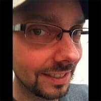 crooked-glasses Zack Czengoldi portrait photo